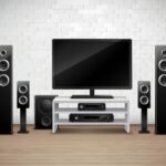 Home theater realistic interior template with tv amplifier and acoustic speakers vector illustration